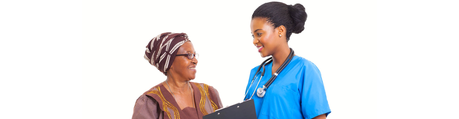 nurse and senior woman smiling each other